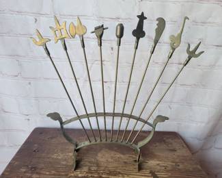 Vintage brass skewer set for kabobs. Missing one skewer.