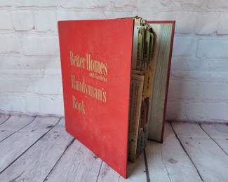 1951 Better Homes and Gardens Handyman's Book with newspaper clippings from the 50s.