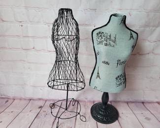 2 small decorative dress forms.