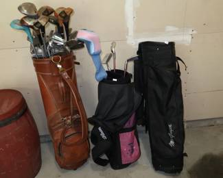 Golf clubs, and a barrel.