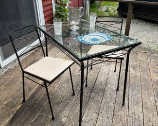 Great heavy iron table and chairs