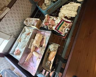 Antique dolls, doll parts and clothes