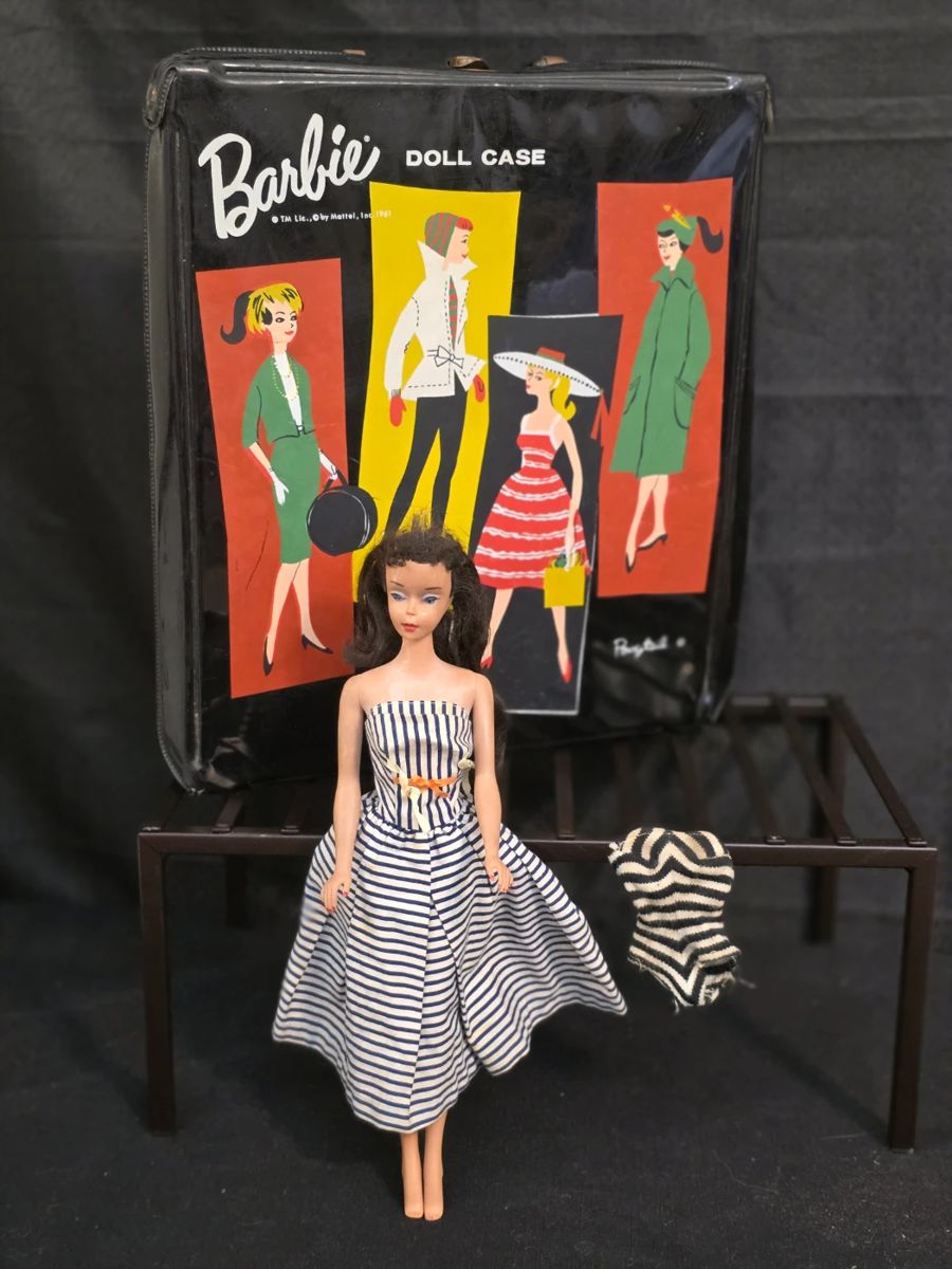 The Orignal Ponytail Brunette Barbie with 1961 carrying case and zebra bathing suit