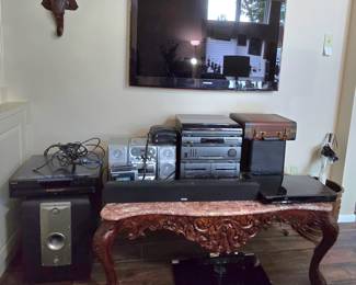 Eletronics, TV, stereo, boom box, LP record album player, sound bar, and more