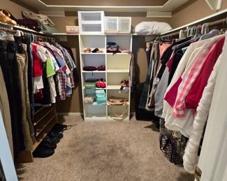 Full closets with some really high-end pieces
