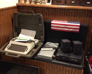 Type writer, tv, speakers electronics, shelf & beer steins