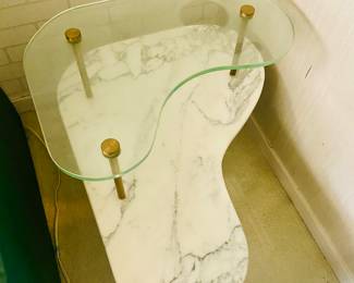 2 MCM Side Tables - Carrara marble on wood frame with spun brass legs. Free standing raised glass platform.