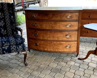 Antique Chests, candle stands and traditional style chair.