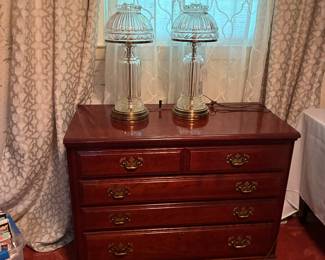 Small chest of drawers and pair of crystal and brass lamps