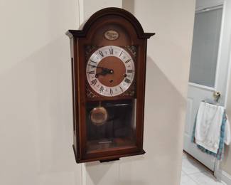 Clock chimes on the hour, half and quarter hours