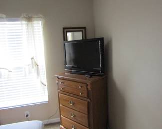 dresser and television