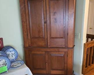Primitive corner cupboard