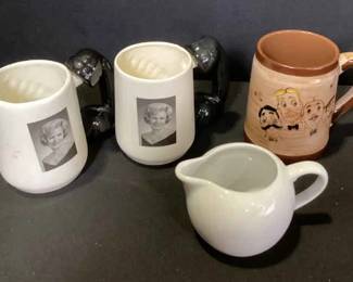 Coffee Cups And A Creamer