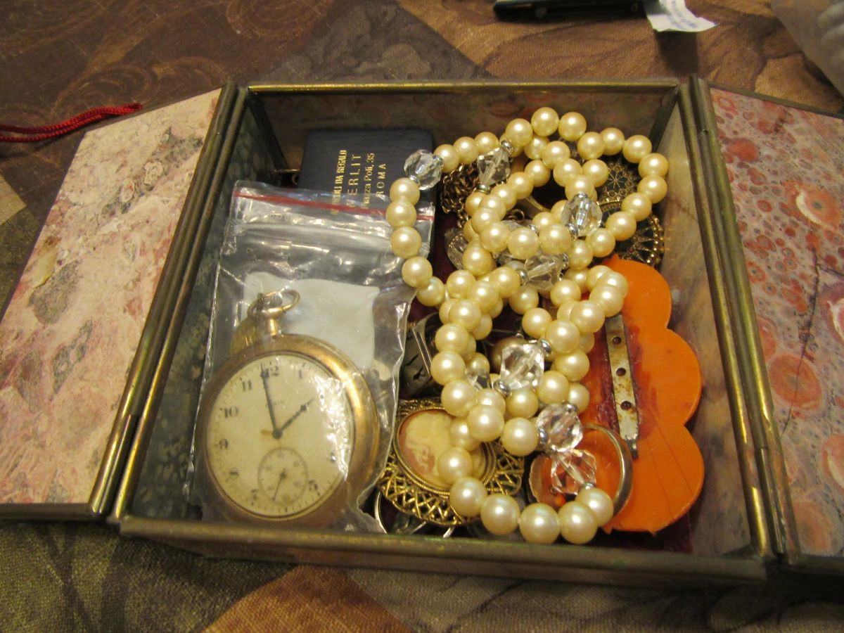 pocket watch, pearls, rings