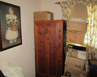armoire art work & boxes of goodies