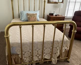 Brass bed and recliner are the only things left in this picture.