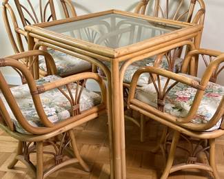 (5pc) Bamboo/Rattan Swivel Dining Chairs & Table | Vintage (mid 20th c.) bamboo and rattan swivel base dining chairs (set of 4) with floral upholstery on seat and square glass top dining table. - h. 30 x w. 29 x d. 29 in