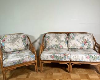 (2pc) Bamboo/Rattan Armchair & Loveseat | Vintage (mid 20th c.) bamboo and rattan armchair and two-cushion loveseat with floral upholstery. Loveseat: h. 28" x w. 50" x d. 30" - h. 27 x w. 30 x d. 26 in (Armchair)