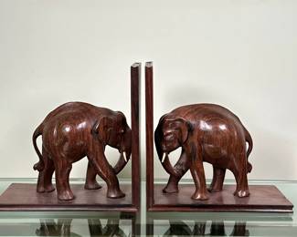 (2pc) Carved Rosewood African Elephant Bookends | Pair of vintage (mid-20th c.) hand-carved rosewood African elephant bookends. - h. 9 x w. 9 x d. 4 in
