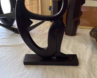 Carved Wooden Sculpture of a Seared Thinking Woman