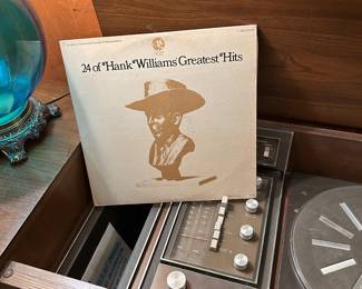 Hank Williams 2 LP Greatest Hits is a must! We have a very nice copy along with a collection of about 100 classic and contemporary Country LPs and compilations on vinyl, also CD's and cassette in the garage. Additionally we have vintage tube radios in the barn, an early sheet music cabinet and vintage electronics for audio and video.