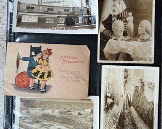 A sampling of Real Photo Post Cards, early Halloween and Valentines greeeting cards and Post card. Notice the chewed corner on the Halloween Post Card Unfortunatleyt many of the older paper items in this sale were stored in the barn but many were preserved well in large lidded tins, which will also be available for purchase in thebarn.