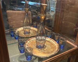 Ventian serving set complete with tray inside a vintage mirrored Phillip Reinisch oak curio,