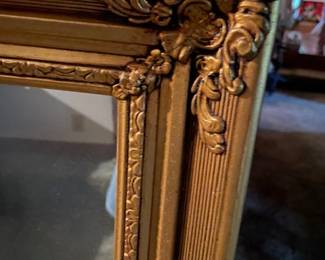 rectangle mirror corner ornamentation detail