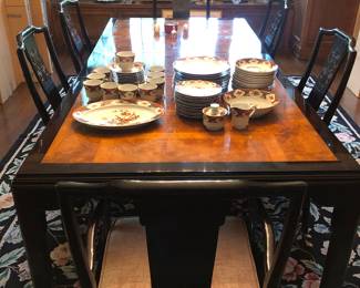 Burl wood top black lacquer dining table probably by Century (must be used with 1 leaf in place). Set of 6 Black lacquer, Chinese style dining chairs by probably by Century.