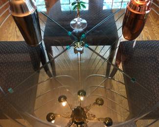 Elegant tripod glass top table by Bruening Glass Works