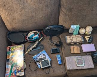 Comic Books, GPS, Digital Recorder, Coach Wallet and Michael Kors Wallet