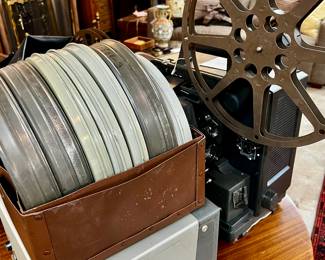 Vintage film projector, film canisters