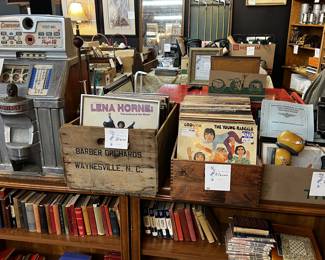Antique slot machine. Vintage albums.