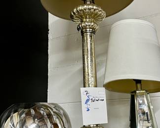 Mirrored finish table, lamps, and globe