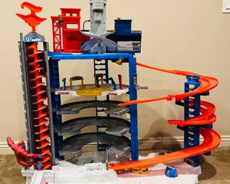 Hot Wheels Super Ultimate Garage Playset.
This playset is over 3 feet tall and can store over 140 cars, making it the biggest Hot Wheels playset.