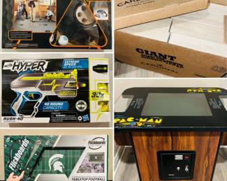 Club Champ Golfer's Putter Pool Game, Nerf Hyper Rush-40 Pump-Action Blaster, indoor/outdoor Michigan State Spartans Flickboard, Giant Jumbling Tower and Arcade1Up Ms. PAC-MAN head-to-head arcade table.