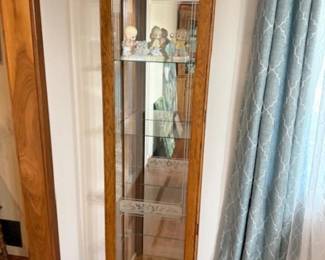 ONE OF TWO MATCHING CURIO CABINETS