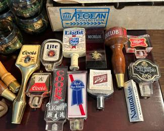Collection of beer tap handles