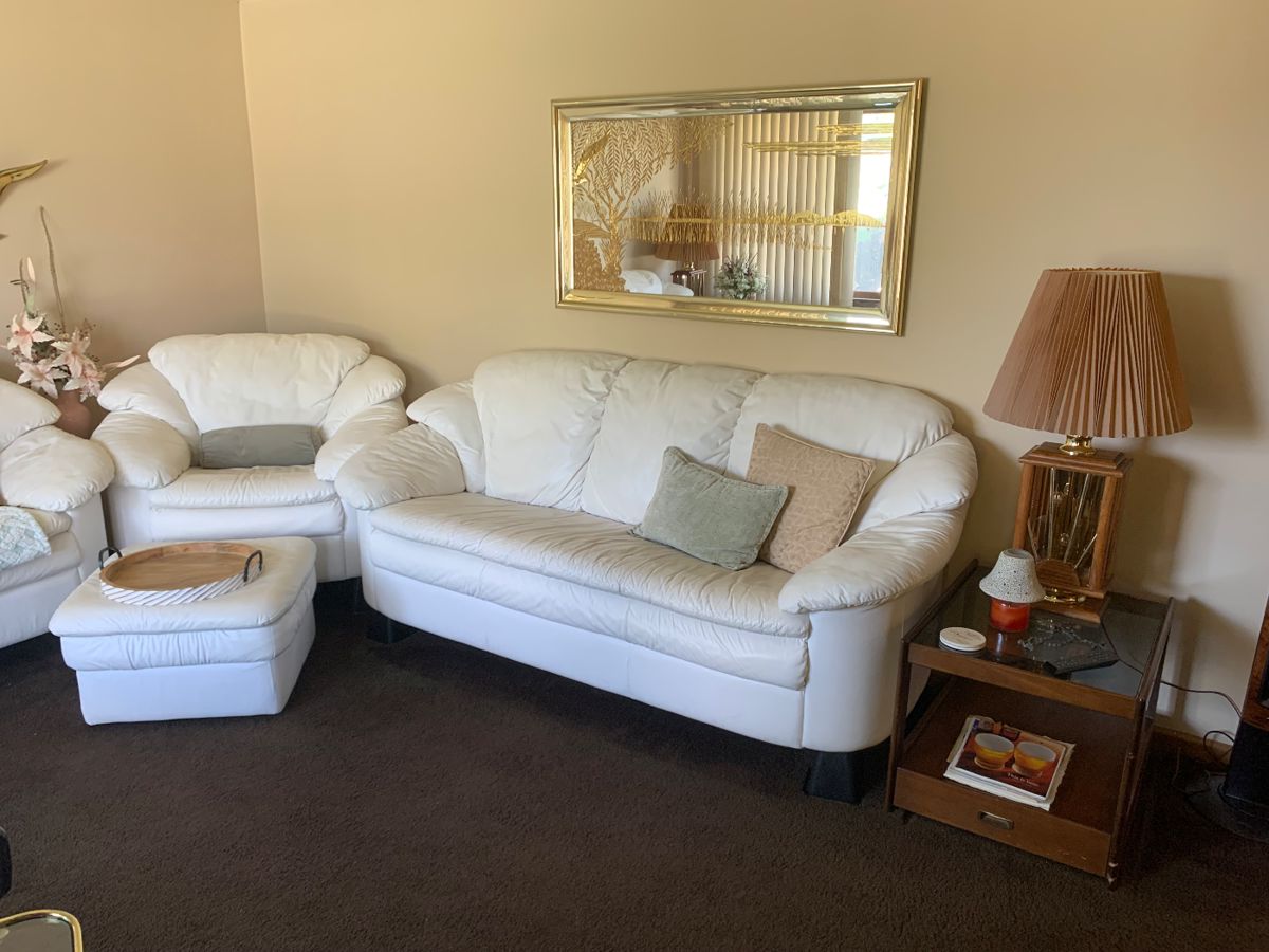 Vintage white leather sofa, chair and ottoman