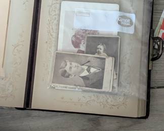 Cabinet card album with random pictures