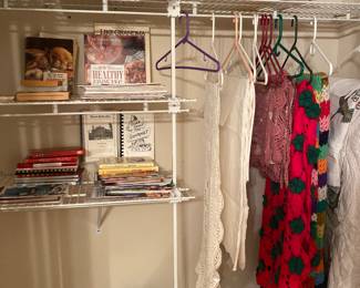 cook books, Irish linen napkins, poinsettia afghan and multi color afghan.