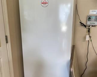 Frigidaire freezer 67" tall, 32" wide.
