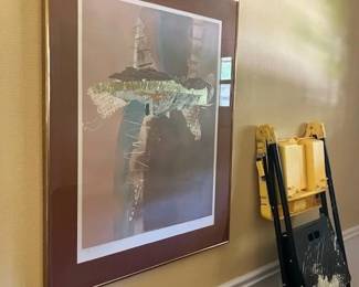 Signed graphic, matted and nicely framed.
