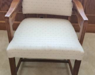 Upholstered and wood armchair