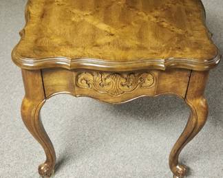 Bernhardt end table with inlaid and carved wood.