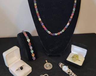 Sterling silver Tiffany & Co heart pendant, GUCCI watch, David Yurman diamond onyx ring, 14k bezel silver Mayan calendar coin pendant, sterling silver multi gem necklace and bracelet, peridot ring