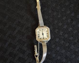 Vintage platinum and diamond Theodore Starr vintage ladies watch
..needs repairs