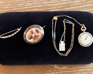 Antique Gold Montana sapphire and pearl brooch, antique enamel French diamond watch necklace, antique Victorian mourning brooch