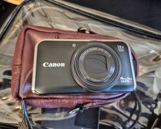 Canon Powershot SX-210
Charger case and cable