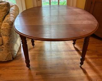 #8 Round Wood Drop-Side Dining Table on Wheels - 26-53x43x29 $125.00
